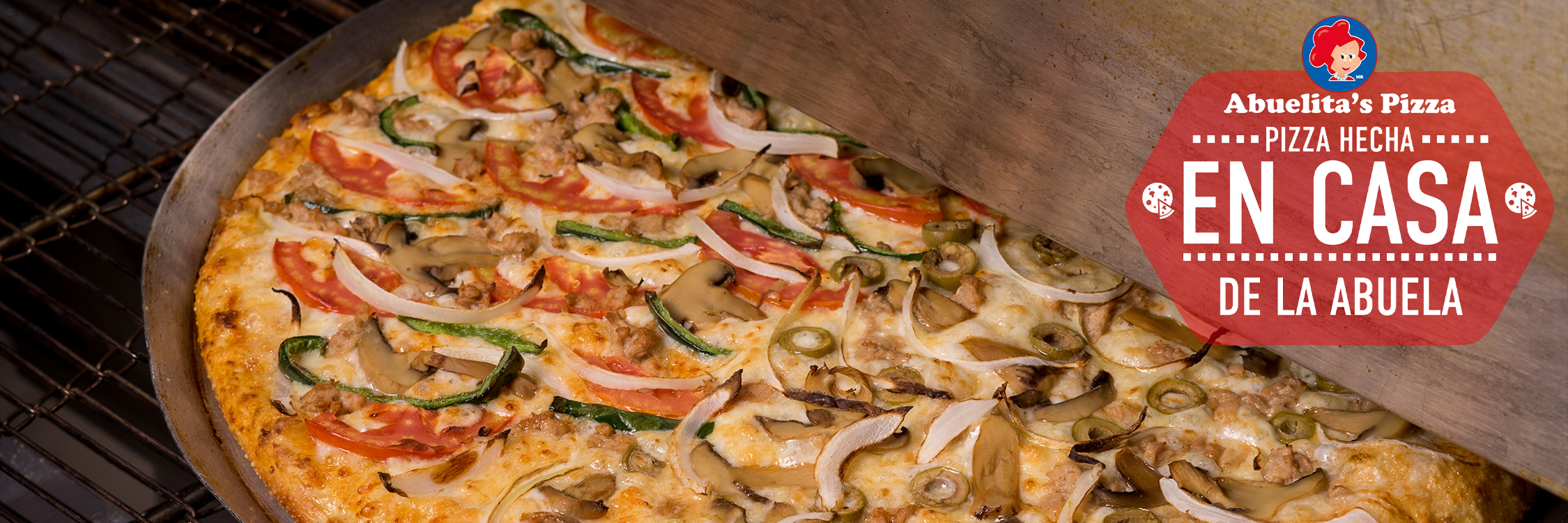 Imagen de una pizza junto a la leyenda: Abuelitas Pizza hecha en casa de la abuela